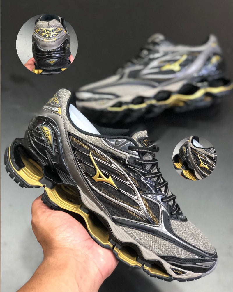 Tênis Mizuno Pro 6 importado cor cinza e dourado
